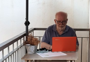 Chris busy writing in Spain during September