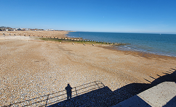 A lonely walk on the seafront near the house